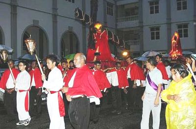 Image: The statue of Christ carrying the cross being paraded around the church compound.