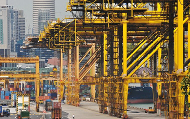 Image: Cranes at Singapore Dock stand idle, waiting for work.